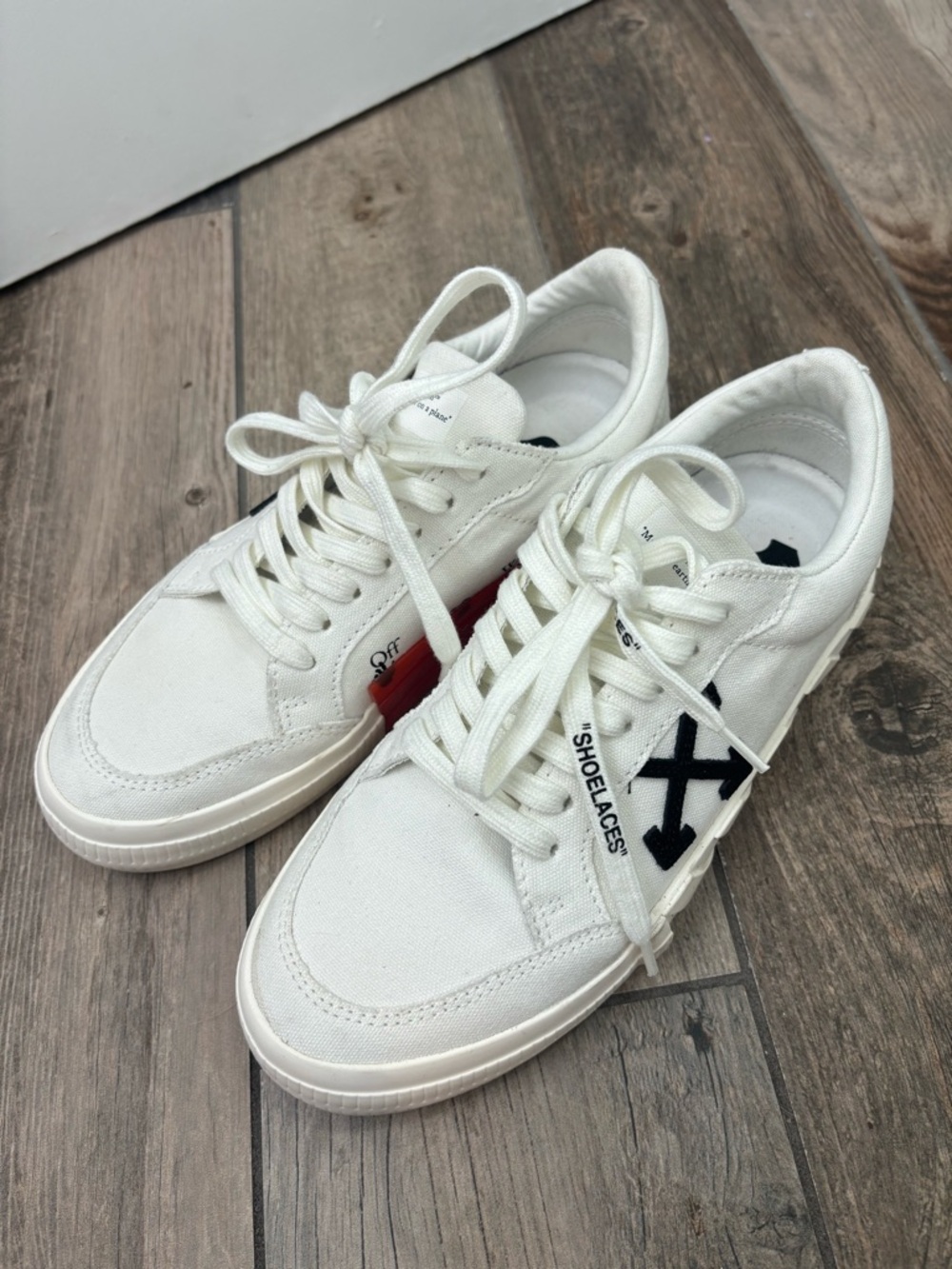 off white low vulcanized canvas sneakers